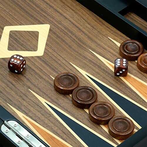 Close-up of a backgammon board with dice and pieces.