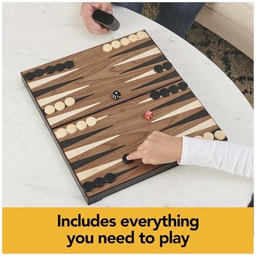 People playing backgammon on a table.