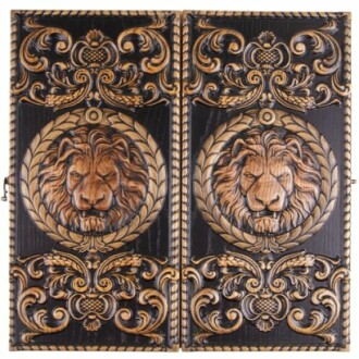 Ornate carved wooden backgammon board with lion design