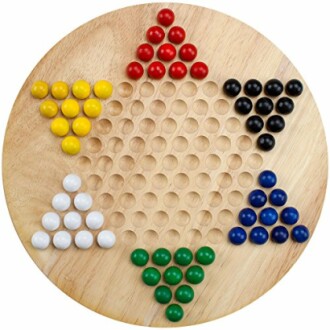 Chinese checkers board with colored marbles.