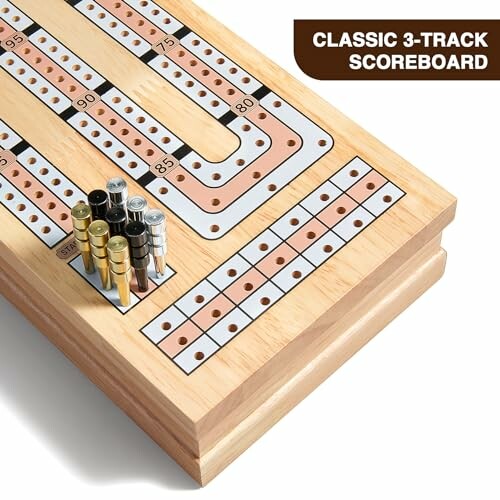 Wooden cribbage board with pegs and scoring tracks.