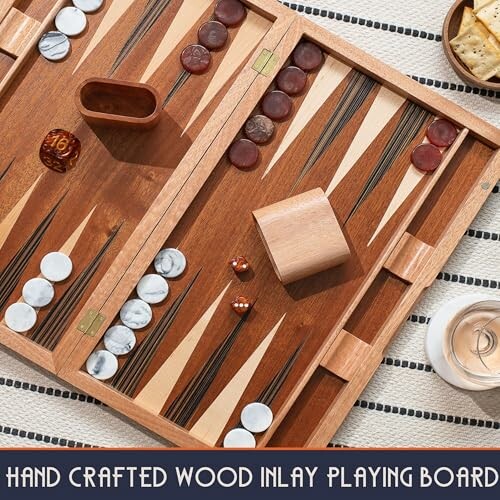 Handcrafted wood inlay playing board with dice and pieces.