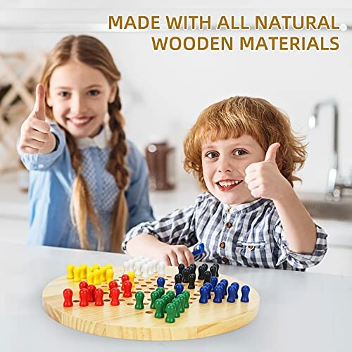 Two children playing a board game with colorful pieces, giving thumbs up.