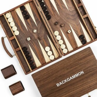 Wooden backgammon set with board, pieces, and dice.