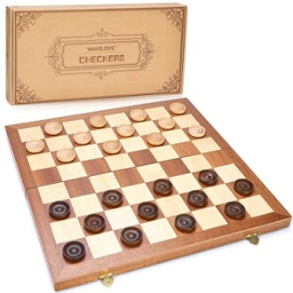 Wooden checkers board set with pieces arranged for a game.