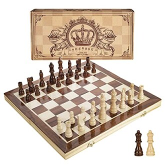 Wooden chess board set with pieces arranged for play.