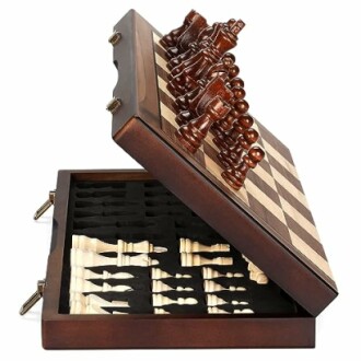 Wooden chess set with storage compartment showing pieces.