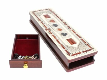 Wooden cribbage board with card symbols and a drawer open to show pegs.