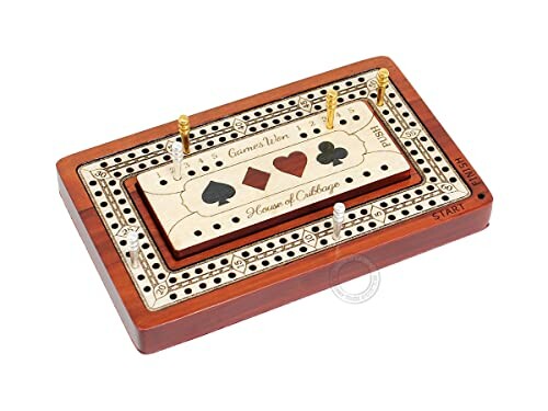 Wooden cribbage board with pegs.